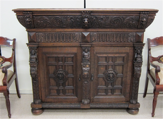 Appraisal: RENAISSANCE STYLE CARVED OAK CABINET English th century having a