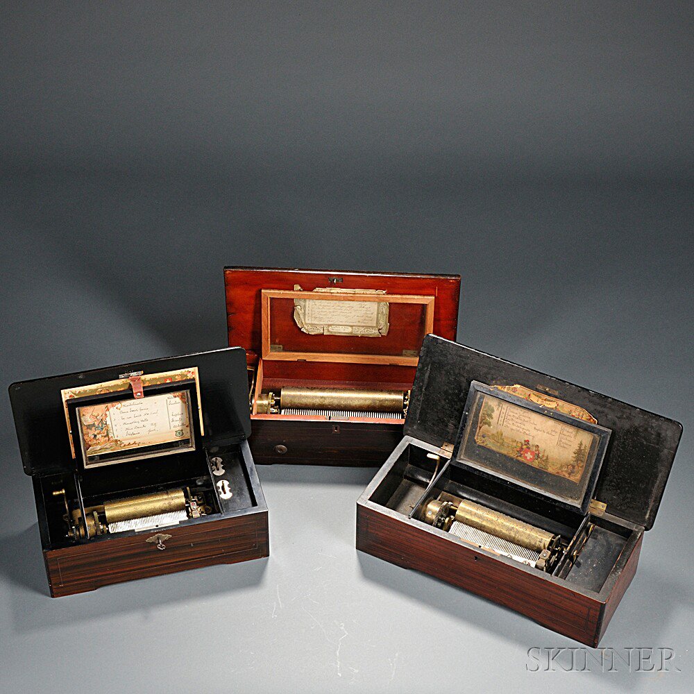 Appraisal: Three Rosewood Veneered Cylinder Musical Boxes Switzerland and -in brass