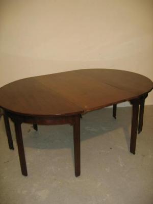 Appraisal: A GEORGE III MAHOGANY DINING TABLE of D ended form