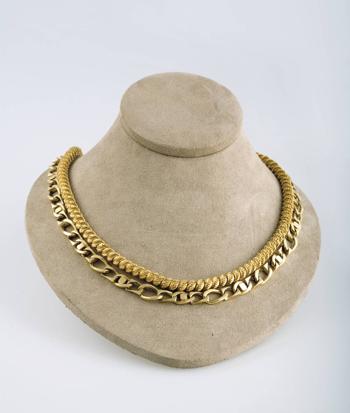 Appraisal: TWO GOLD NECKLACES The first a kt gold rope twist