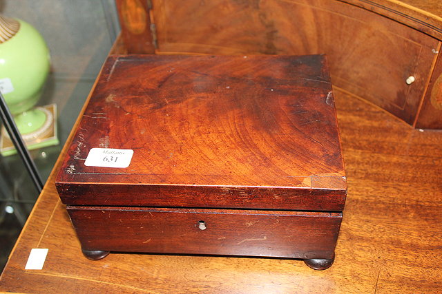 Appraisal: A REGENCY MAHOGANY WORKBOX standing on bun feet cm wide