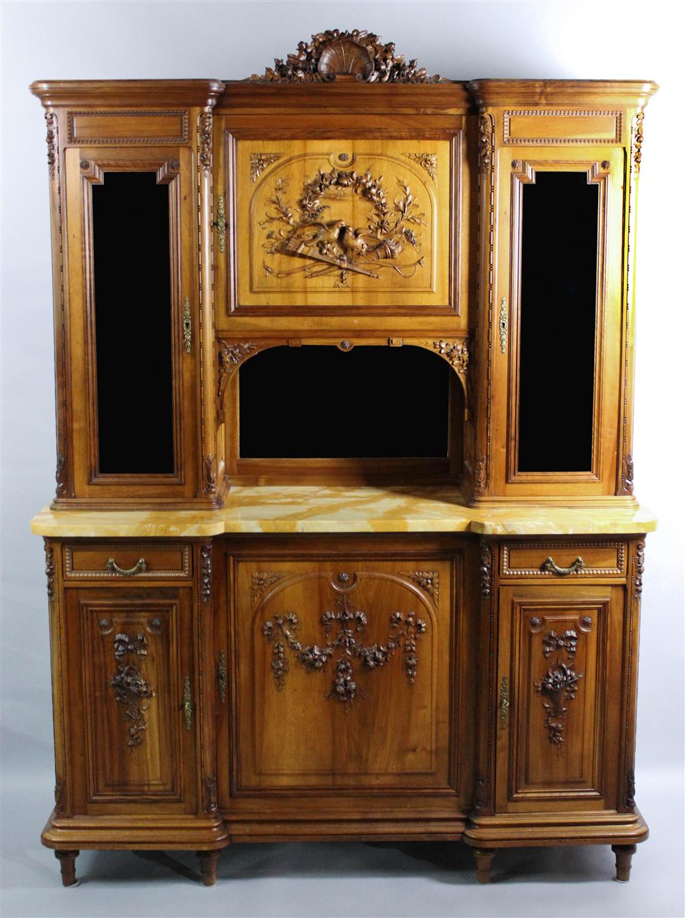 Appraisal: FRENCH PROVINCIAL STYLE CARVED WALNUT AND MARBLE BUFFET A DEUX