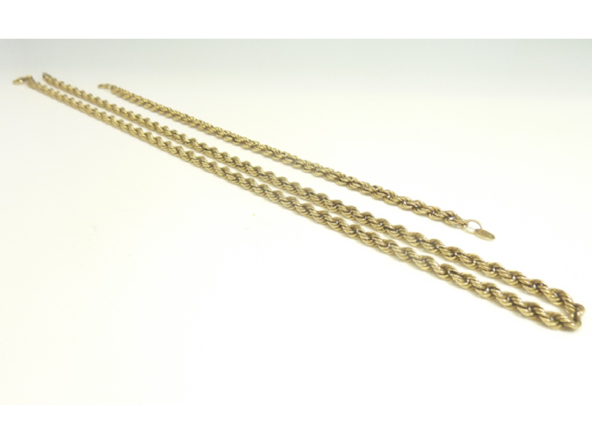 Appraisal: A ct gold rope-twist necklace and matching bracelet g in