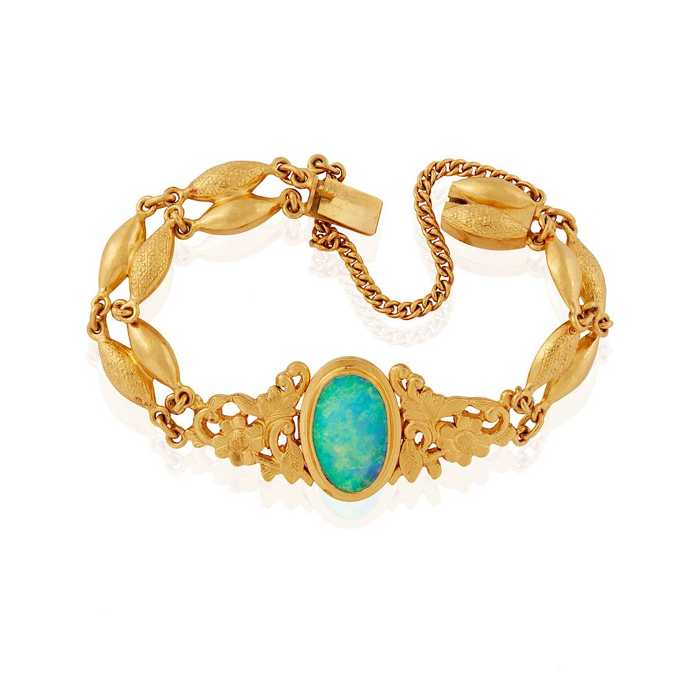 Appraisal: k Opal Bracelet k bracelet containing a center opal mm