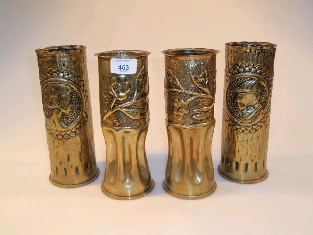 Appraisal: A pair of brass shell case vases with cameo profile