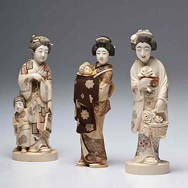 Appraisal: Carved and Inked Ivory Geishas Japanese three carved and inked