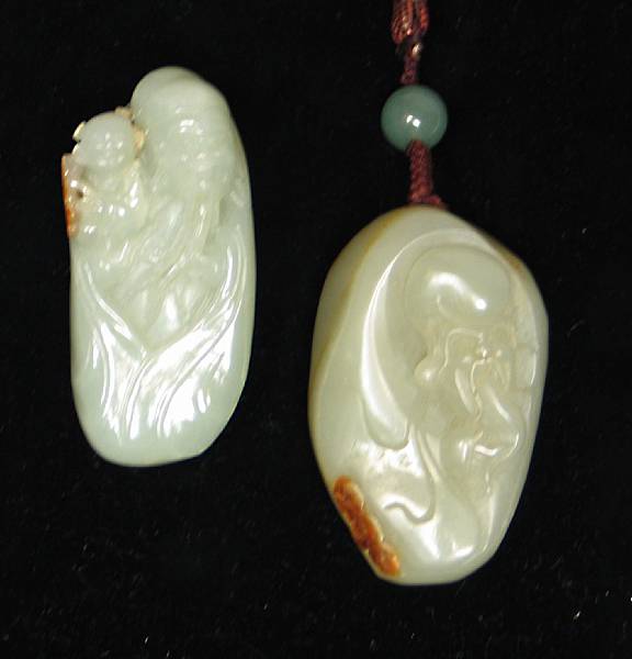 Appraisal: Two pebble form jade carvings Each depicting an immortal in