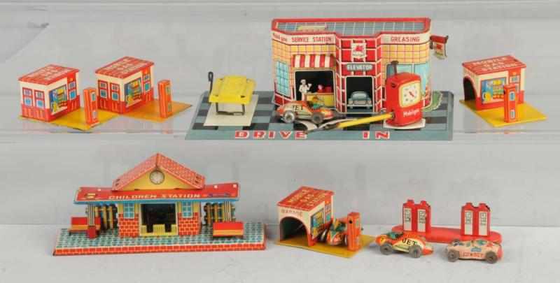 Appraisal: Lot of Tin Litho Garage Items Description Japanese Includes six