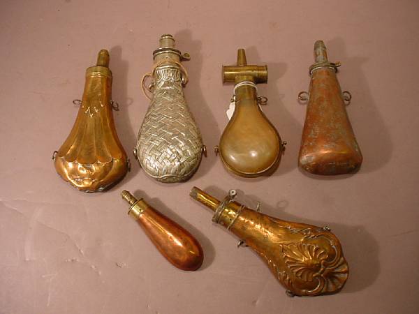 Appraisal: A lot of six powder flasks Including a brass-mounted lanthorn