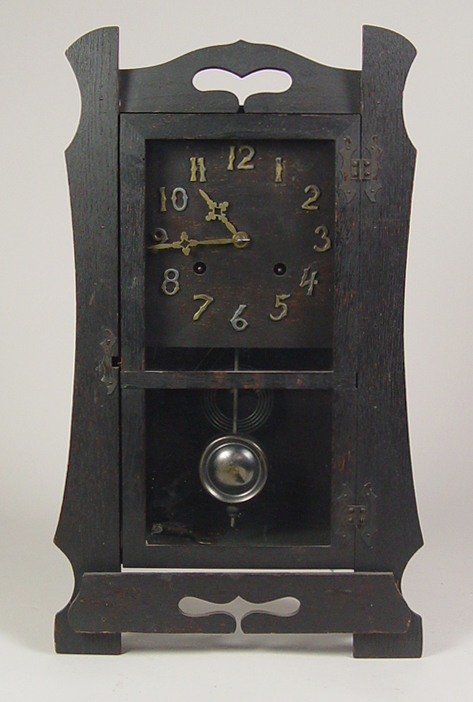 Appraisal: Oak Mission Style Shelf Clock Early th Century Cast brass