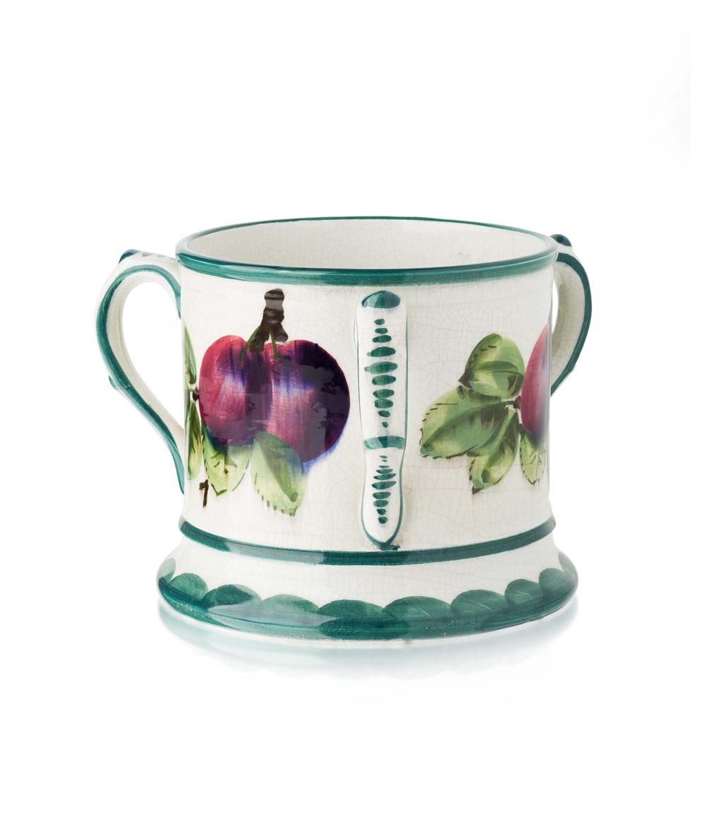 Appraisal: WEMYSS WARE SMALL 'PURPLE PLUMS' PATTERN LOVING CUP CIRCA impressed