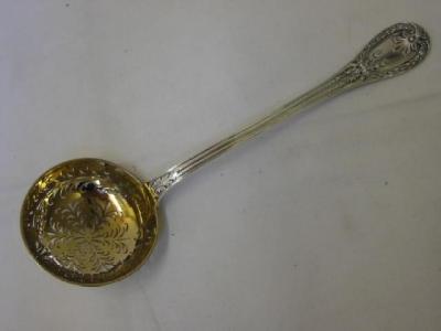 Appraisal: A FRENCH SIFTER SPOON by Mon Odiot Paris the gilded