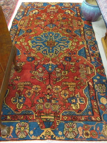 Appraisal: PERSIAN HAMADAN CARPET stylized floral and central medallion design on