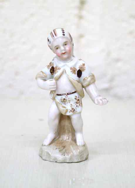 Appraisal: A TH CENTURY CONTINENTAL PORCELAIN FIGURINE of a child in