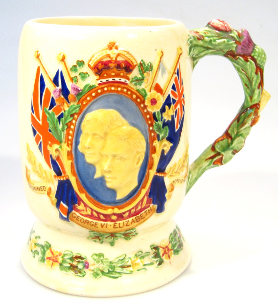 Appraisal: A thC Crown Devon Fieldings musical tankard George VI and