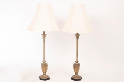 Appraisal: A pair of Empire style table lamps with vase-shaped supports