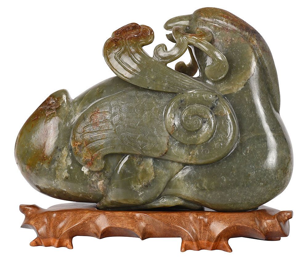 Appraisal: Large Carved Hardstone Duck on Stand Chinese green and brown