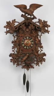 Appraisal: Black Forest cuckoo clock w carved birds Carved Black Forest