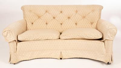 Appraisal: An Edwardian reverse bowfront two seater settee with scroll over