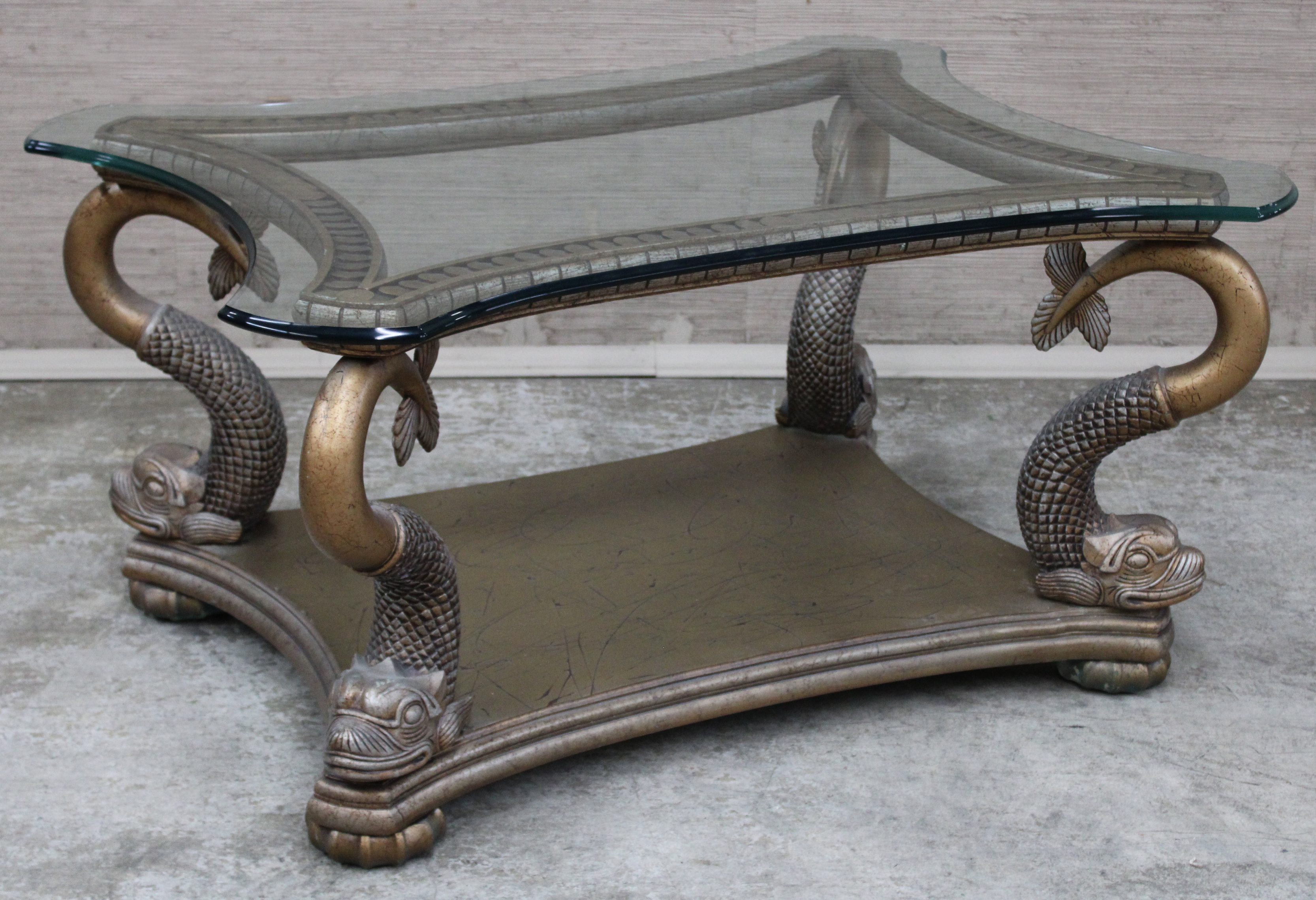 Appraisal: ENGLISH REGENCY STYLE DOLPHIN FORM LOW TABLE English Regency style