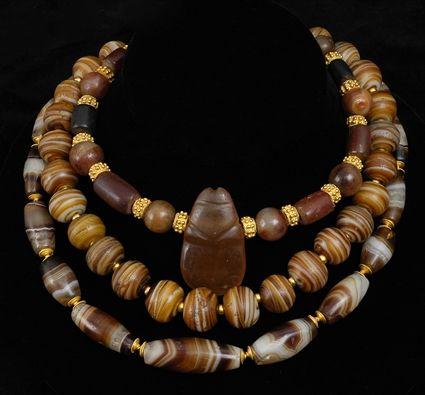 Appraisal: Two Necklaces of Mesopotamian Agate Beads together with a necklace