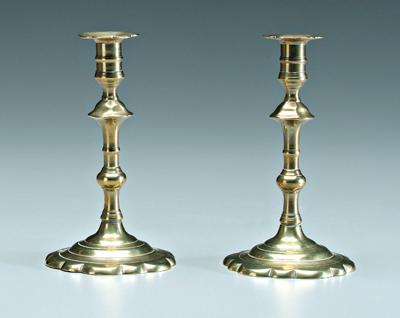 Appraisal: Pair th century brass candlesticks circular scalloped bases baluster posts