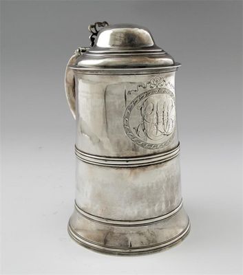 Appraisal: A George III tapering tankard with a flared base moulded