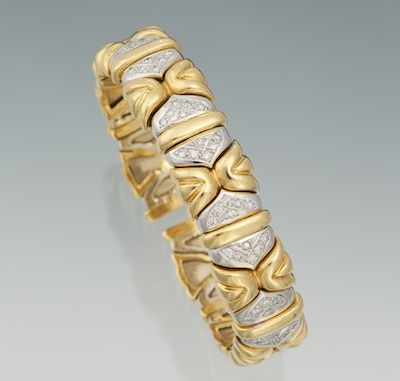 Appraisal: A Ladies' Two Tone Gold and Diamond Flex Bangle Bracelet