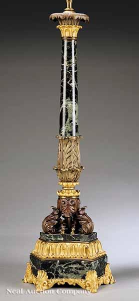 Appraisal: A French Gilt and Patinated Bronze and Green Marble Candelabrum