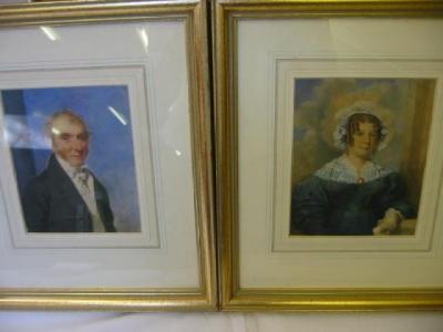 Appraisal: ENGLISH SCHOOL Portraits of a Lady and Gentleman half length