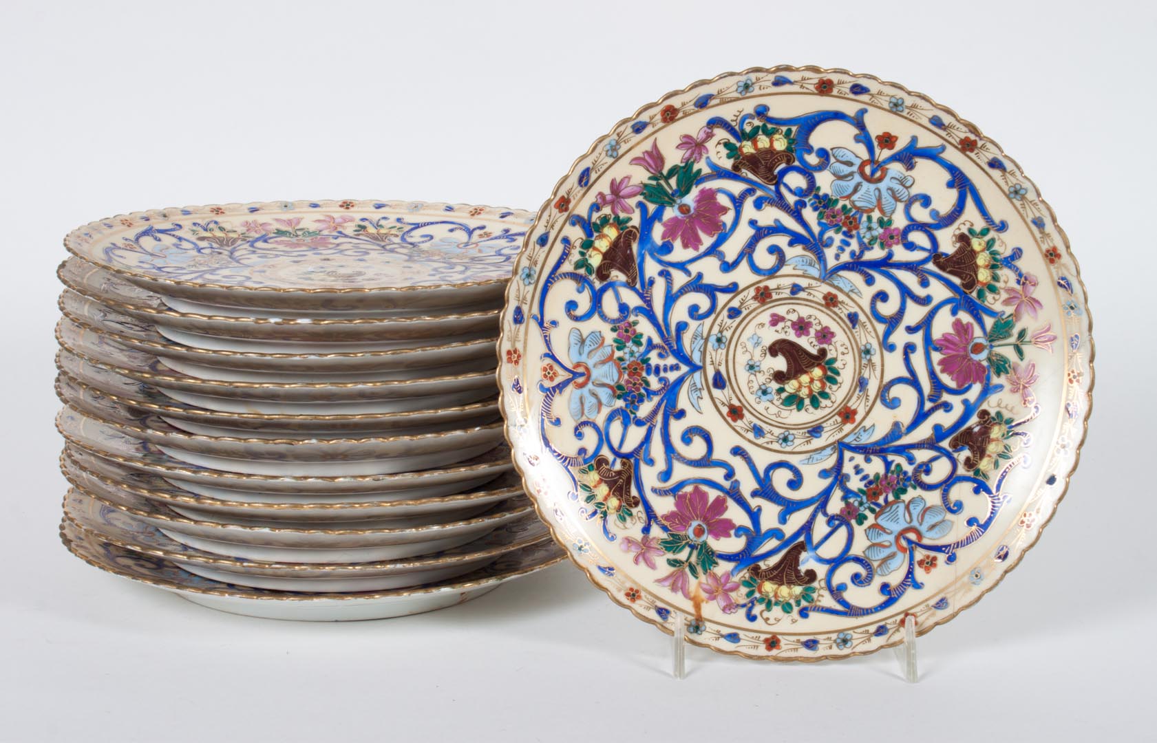 Appraisal: Vienna porcelain luncheon plates late th century with stylized cornucopia