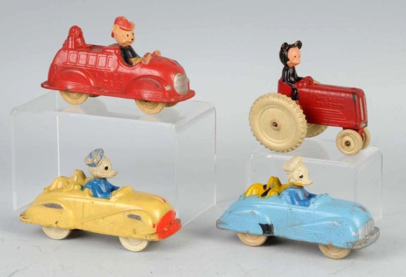 Appraisal: Lot of Walt Disney Auburn Rubber Vehicle Toys Description Two