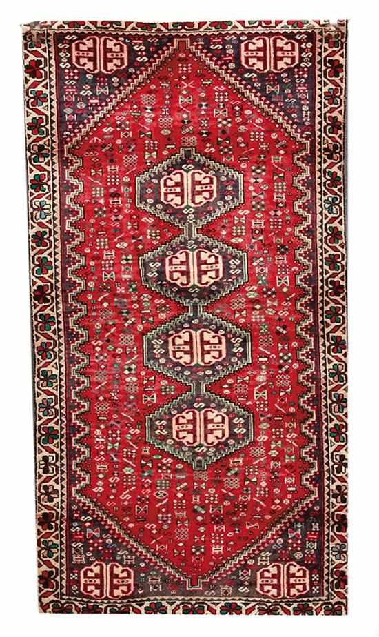 Appraisal: Persian Shiraz carpet ' '' x ' ''