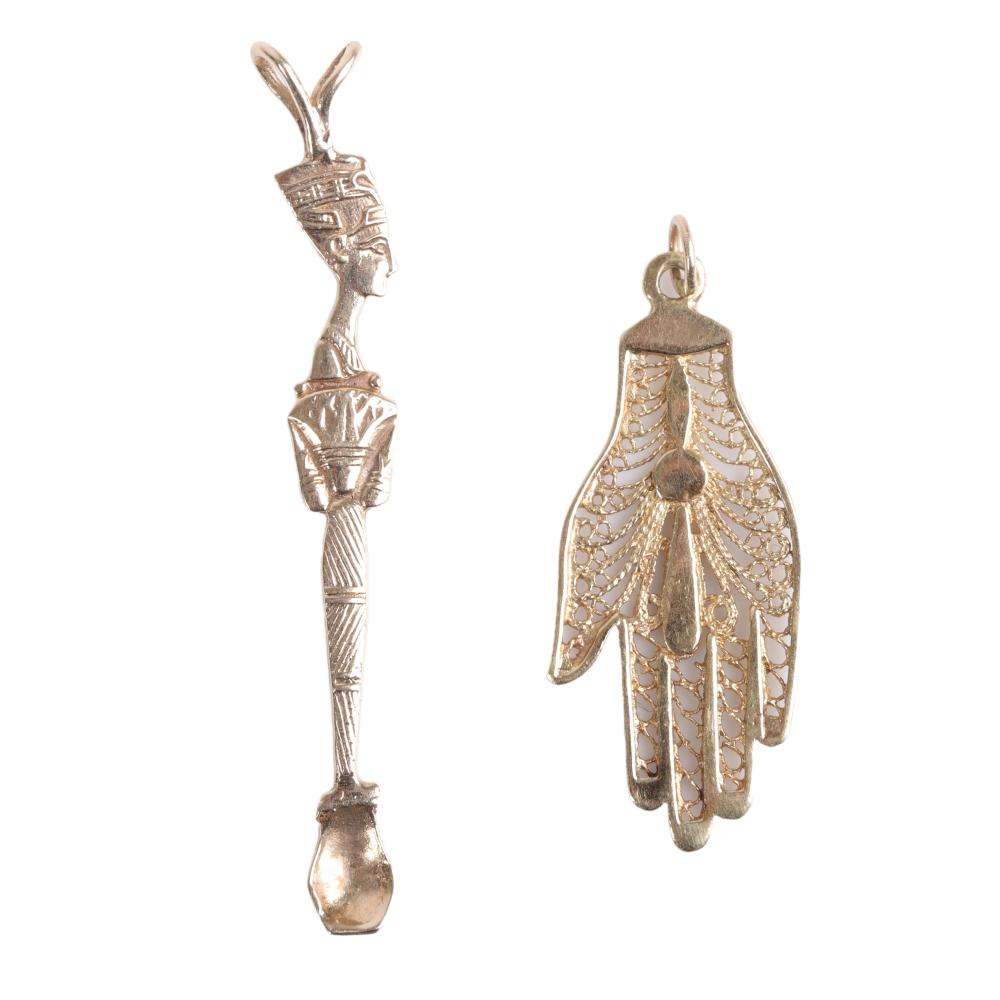 Appraisal: Two K yellow gold figural pendants Egyptian Revival Queen Nefertiti