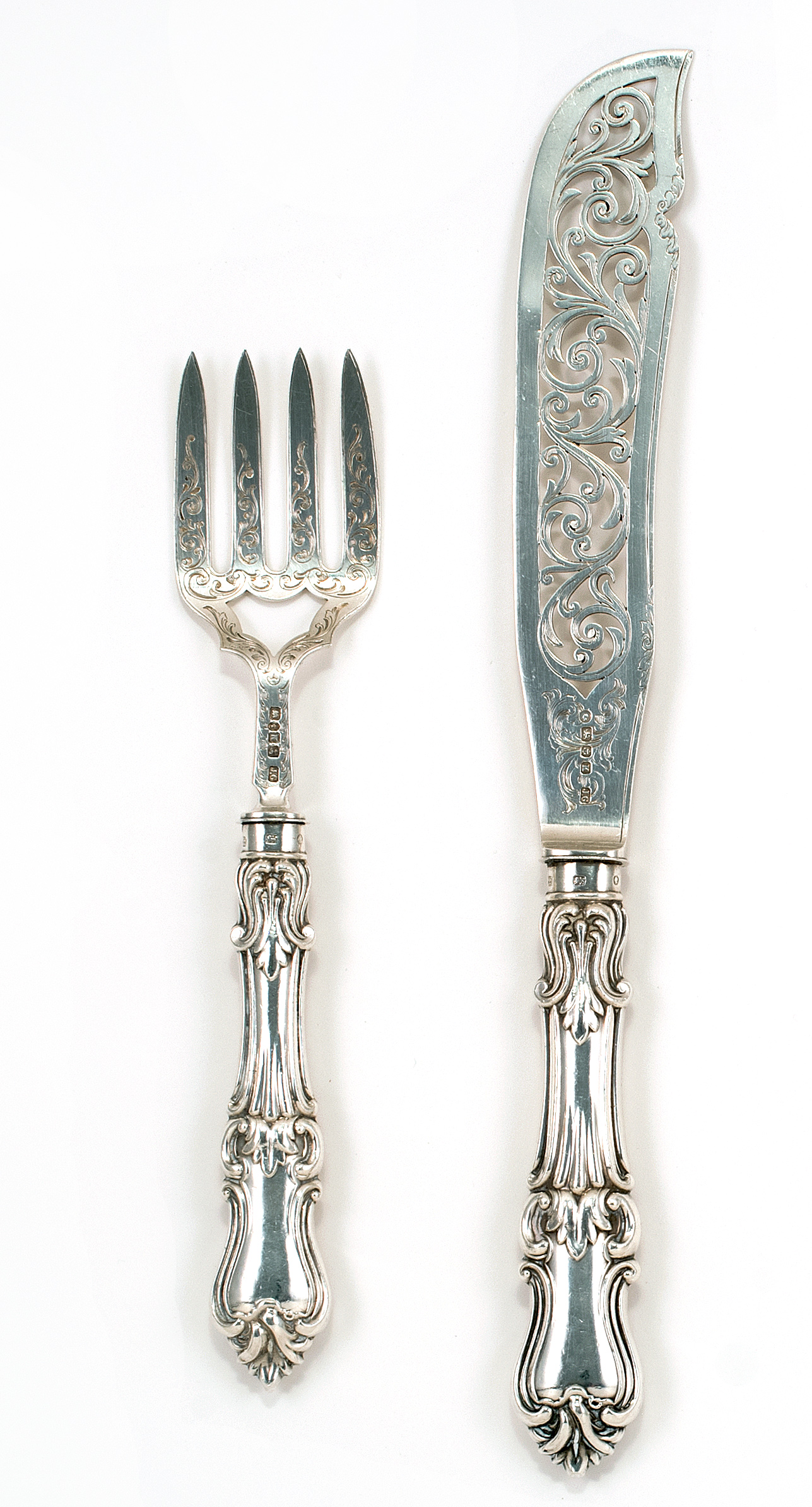 Appraisal: ENGLISH STERLING SILVER SERVING FORK AND KNIFE Both with foliate