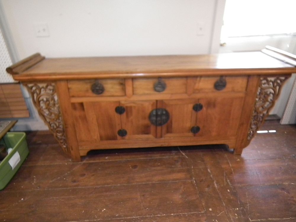 Appraisal: OLD CHINESE SIDEBOARD Old Chinese carved wood sideboard ft long