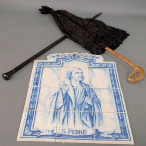 Appraisal: Blue ceramic tiles depicting St Peter S Pedro a parasol