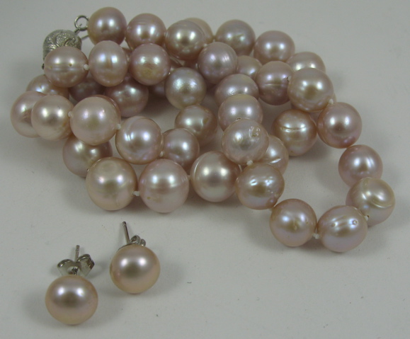 Appraisal: THREE ARTICLES OF VIOLET PEARL JEWELRY including a violet pearl