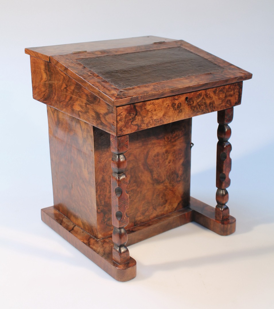 Appraisal: An early thC burr walnut veneered apprentice Davenport desk the