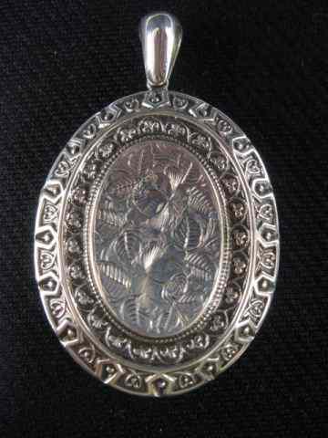 Appraisal: English Victorian Sterling Silver Oval Locket elaborate floral hallmarked circa