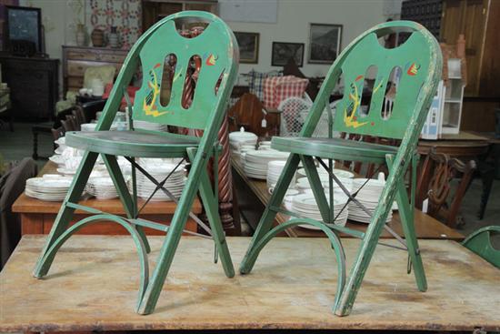 Appraisal: FOUR LOUIS RASTETTER CHAIRS Folding green painted chairs with Art