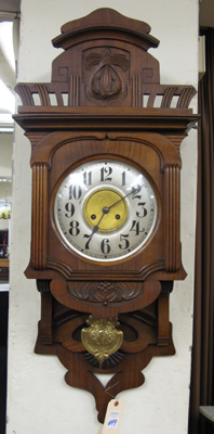 Appraisal: A WALNUT CASED BELINER WALL CLOCK Junghans Clock Workshops German