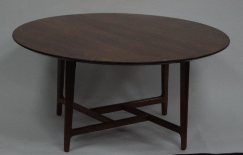 Appraisal: A Danish rosewood coffee table the circular top on legs