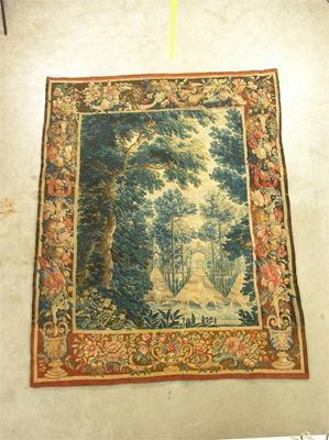 Appraisal: An th century Brussels verdure tapestry fragment the central panel