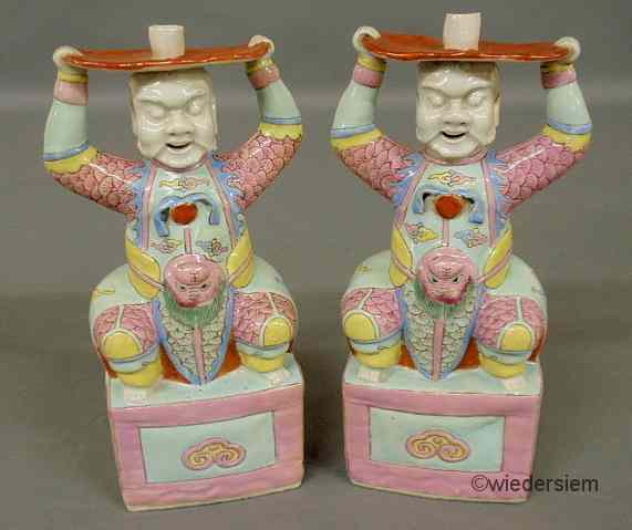 Appraisal: Pair of Chinese porcelain Chien-lung jolly men taper holders ''h