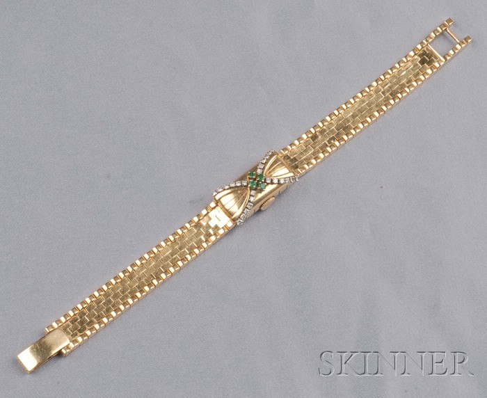 Appraisal: Lady's kt Gold Emerald and Diamond Covered Wristwatch Gubelin the