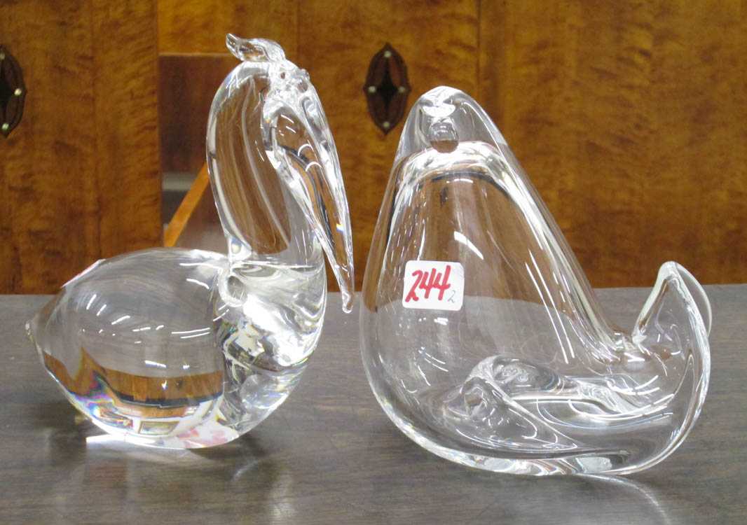 Appraisal: TWO STEUBEN CRYSTAL FIGURAL SCULPTURES Pelican designed by Lloyd Atkins