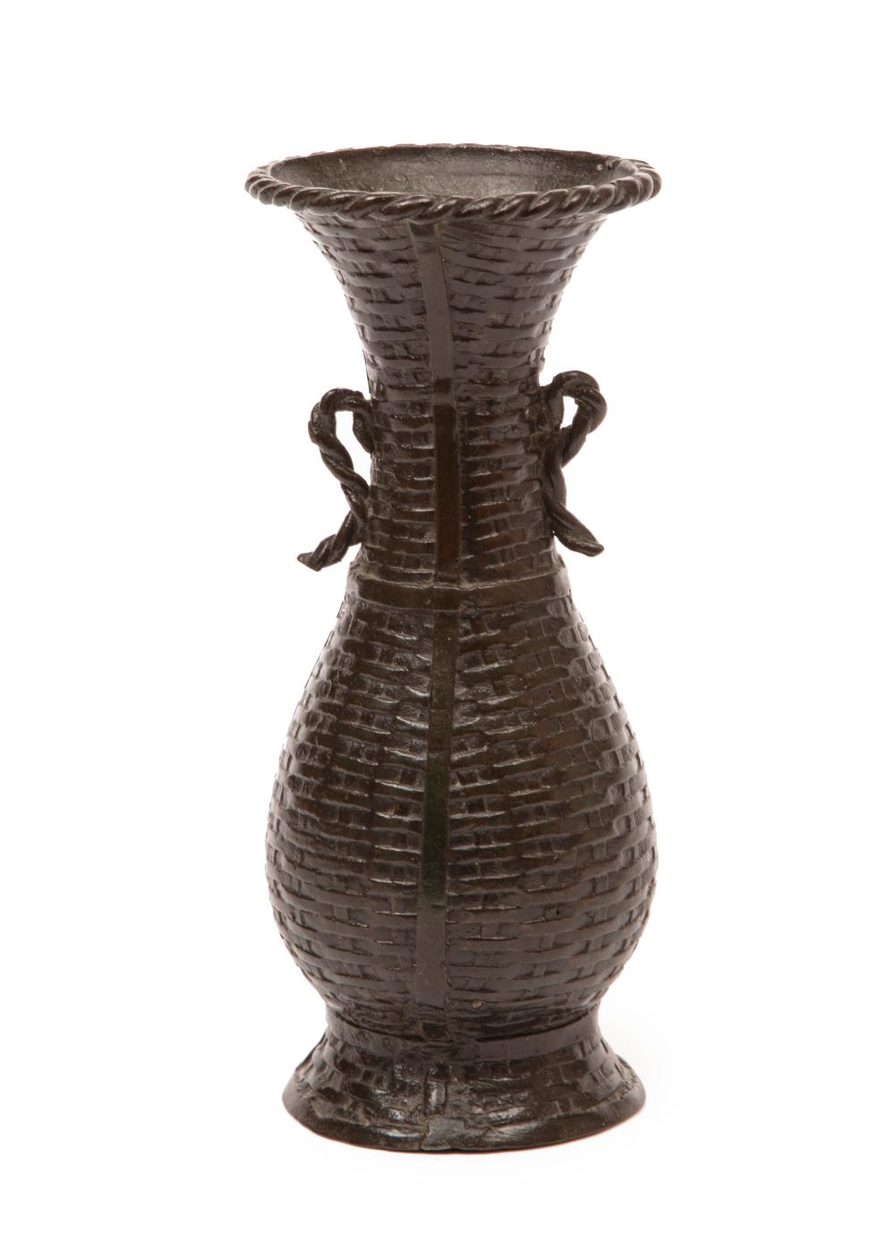 Appraisal: Antique Japanese Bronze Vase rope-twist scroll handles overall basketweave diaper