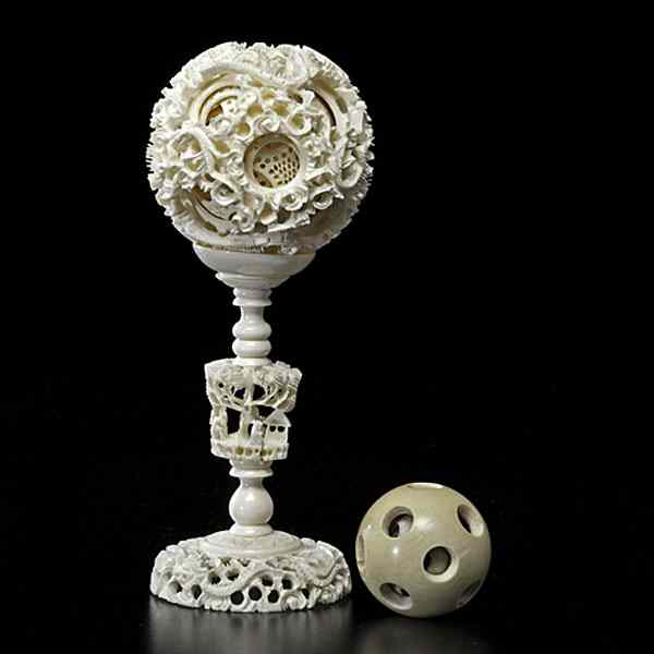 Appraisal: Chinese Ivory Puzzle Ball Plus Chinese late th century An