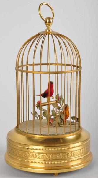 Appraisal: Brass Bird Cage with Birds Description Birds sing and move